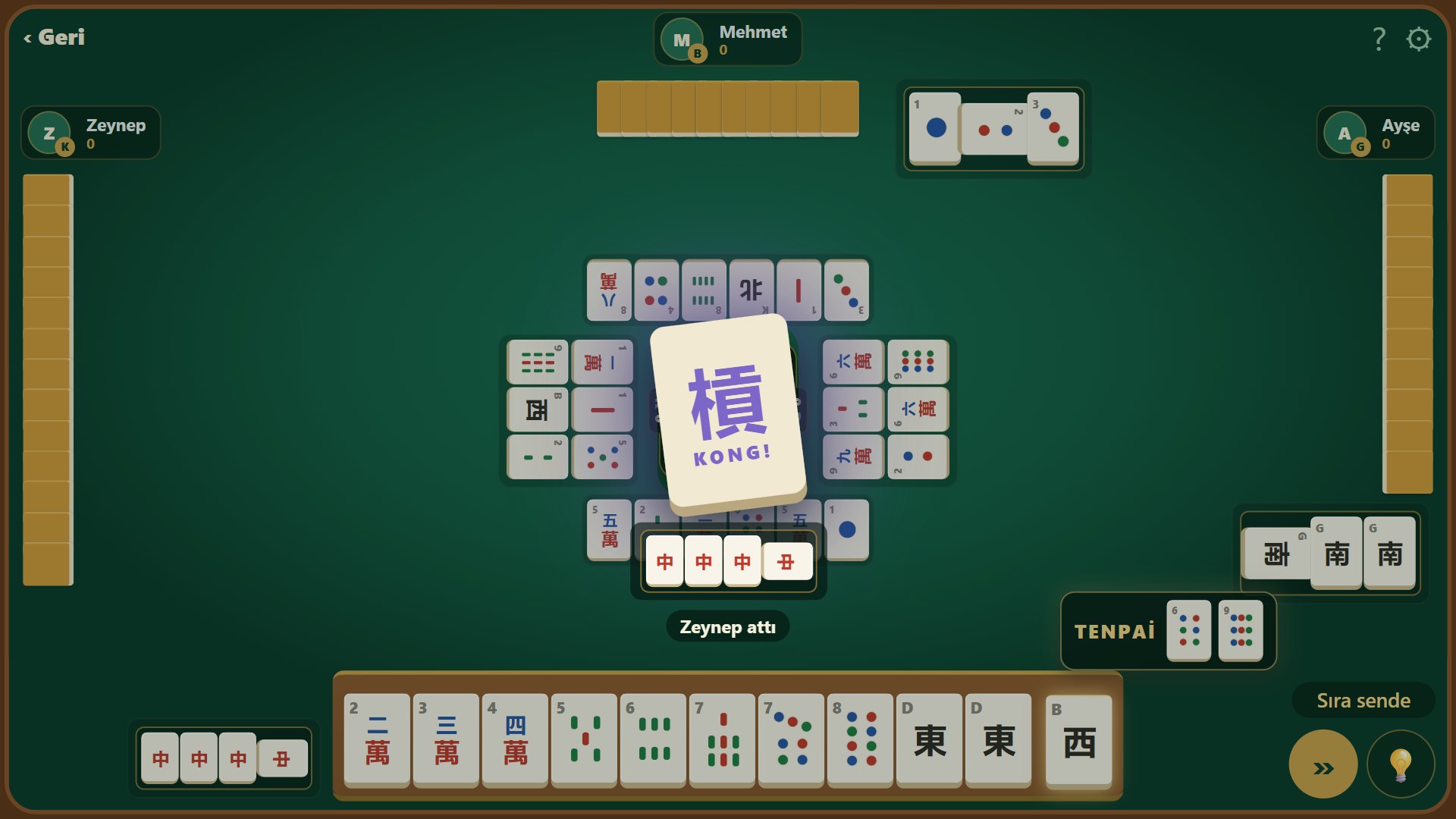 Claiming a kong: the callout in the middle of the table with all four tiles
